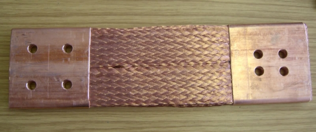 Braided busbar connector rated 1600 Amps. We design and manufacture these in size ranging from 400 Amps to 400 Amps in plain (red, bare,) copper or tin plated copper.